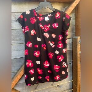 CAbi black blouse with pink floral motif